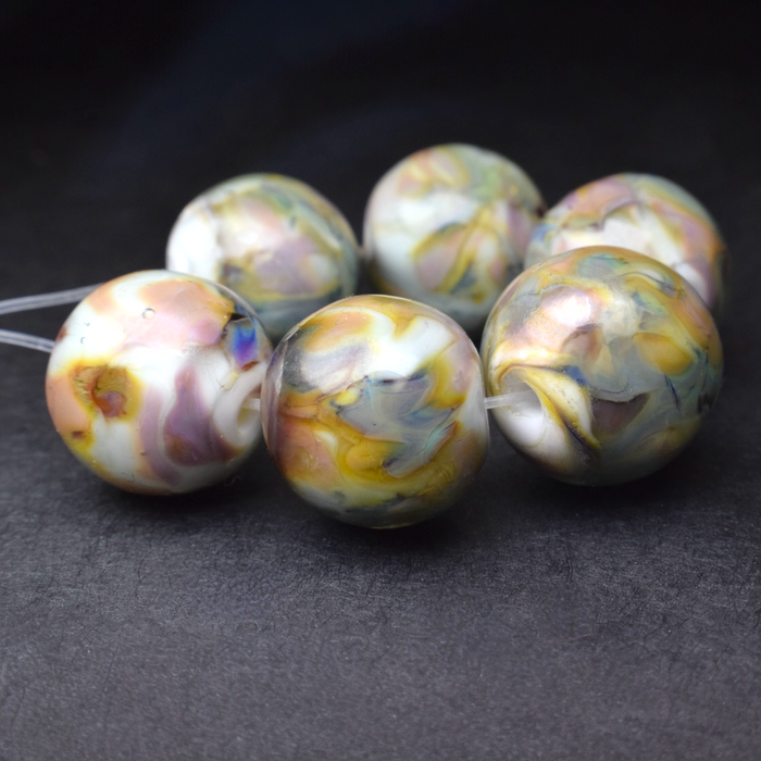 Whispering Orbs: Handmade Lampwork Glass Beads