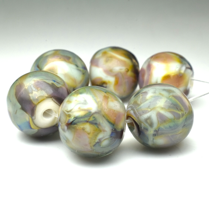 Whispering Orbs: Handmade Lampwork Glass Beads