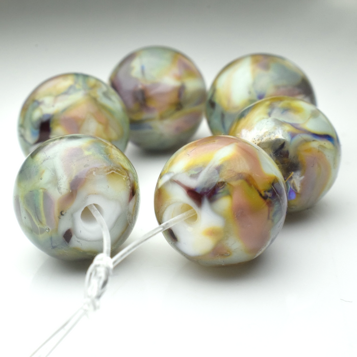 Whispering Orbs: Handmade Lampwork Glass Beads