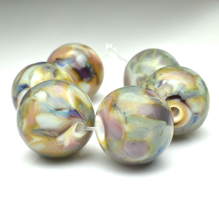 Whispering Orbs: Handmade Lampwork Glass Beads