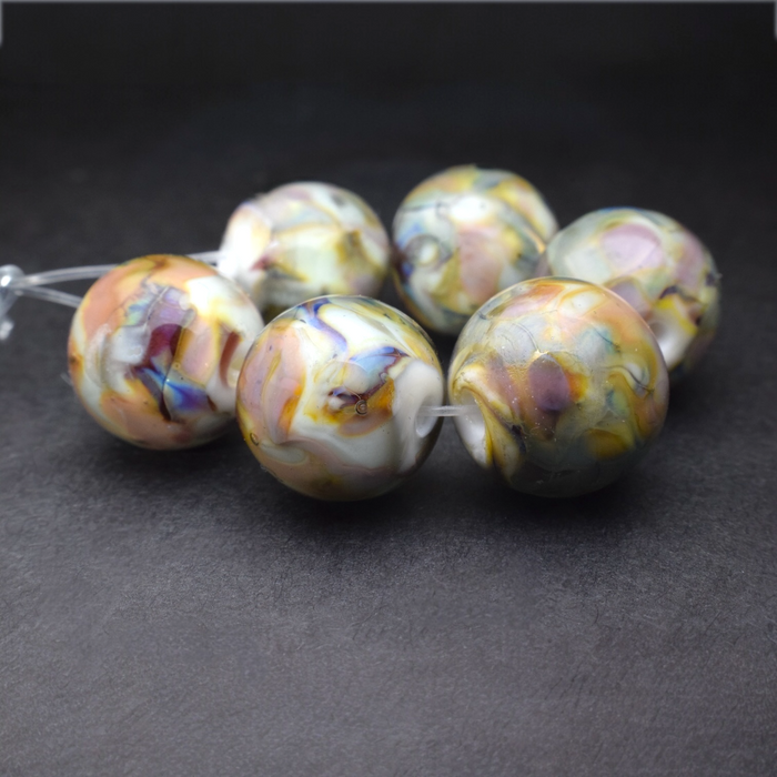 Whispering Orbs: Handmade Lampwork Glass Beads